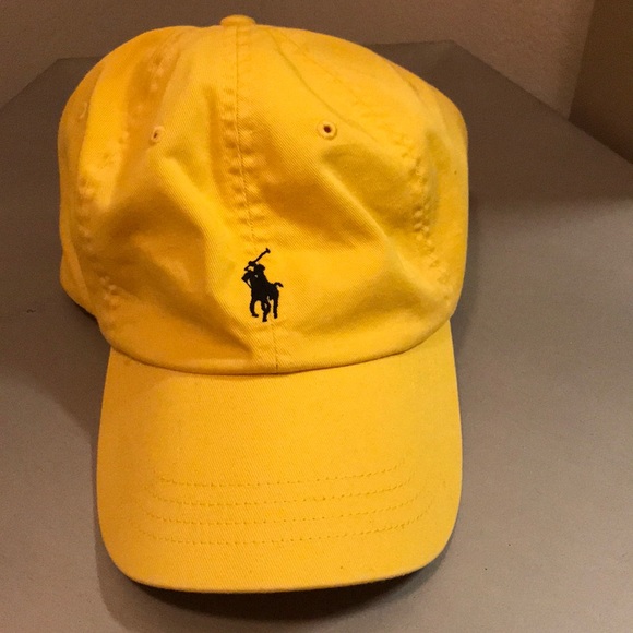 yellow polo hat with leather strap